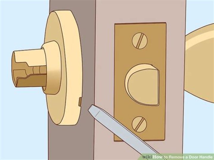 How do you remove a privacy door handle?